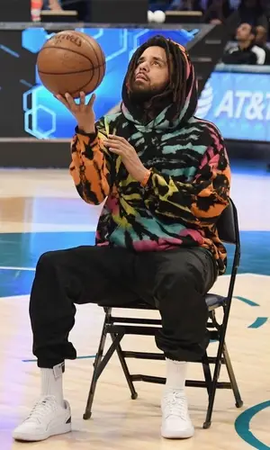 J. Cole wearing Prada pants