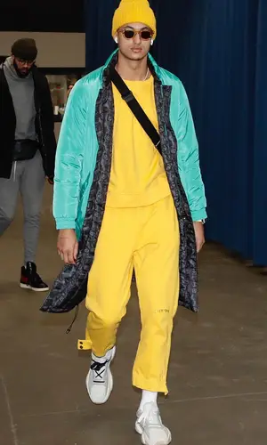 Kyle Kuzma wearing Sevin Kasran sweater
