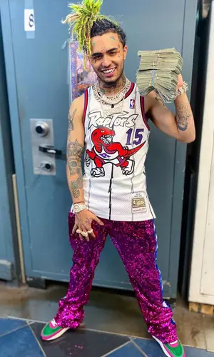 Lil Pump wearing Mitchell & Ness jersey