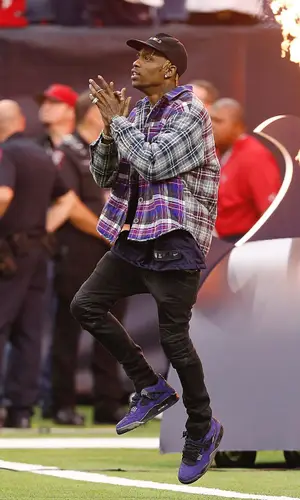 Travis Scott wearing Nike jersey