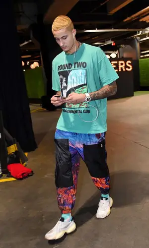Kyle Kuzma wearing Round Two shirt