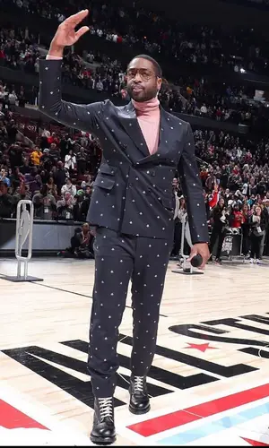 Dwyane Wade wearing Gucci suit