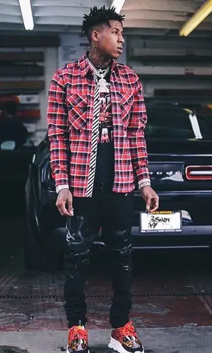 NBA YoungBoy wearing Off-White shirt