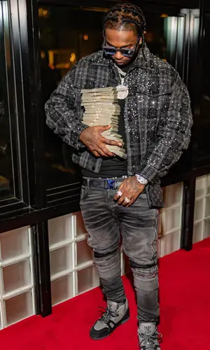 Pop Smoke’s Outfit in Amiri Jeans, Cartier Watch & Louis Vuitton Eyewear (2020)