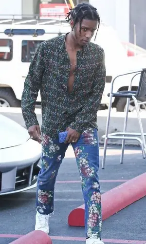 ASAP Rocky wearing Gucci shirt