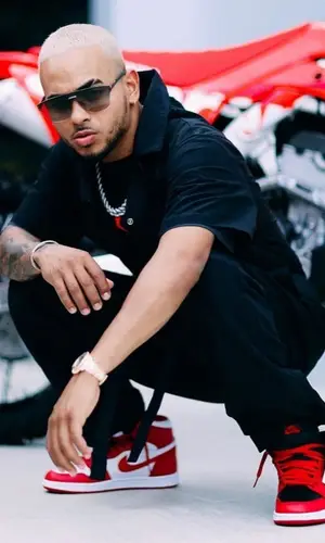 Ozuna wearing Prada eyewear