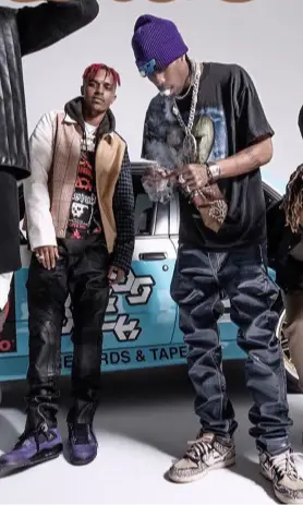 Travis Scott wearing Prada hat