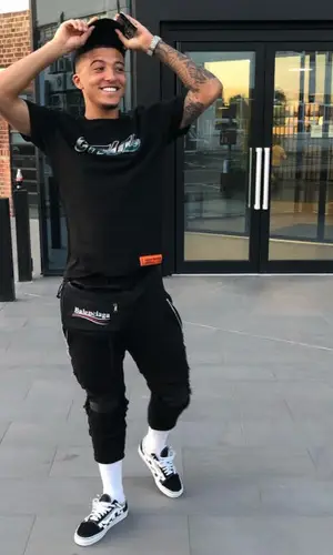 Jadon Sancho wearing Heron Preston t-shirt