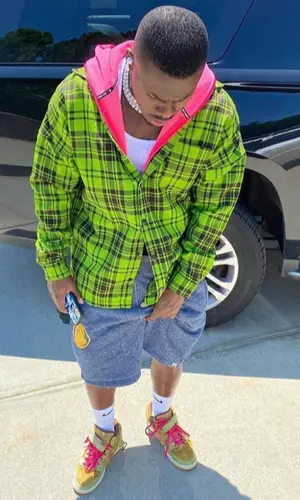 DaBaby wearing Palm Angels shirt