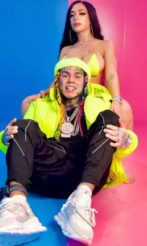 6ix9ine wearing 6ix9ine Merch t-shirt