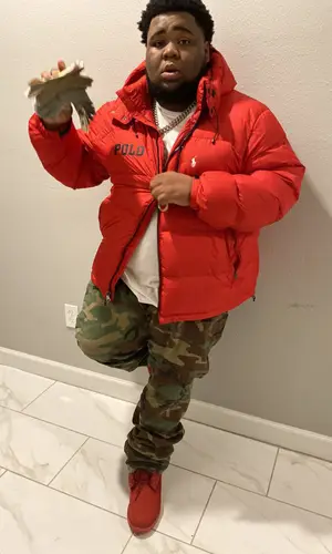 Rod Wave wearing Polo Ralph Lauren jacket
