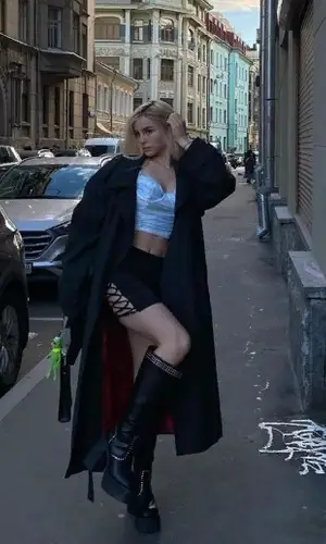 Maryana Ro wearing Dollskill boots