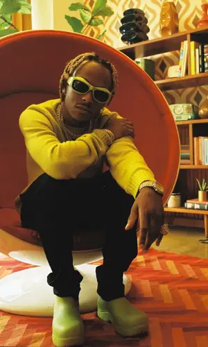Rich The Kid wearing Bottega Veneta sweater