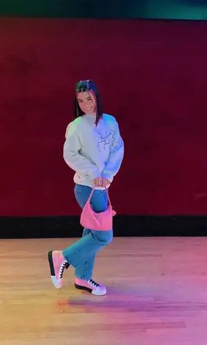 Charli D'Amelio wearing Nike sweatshirt