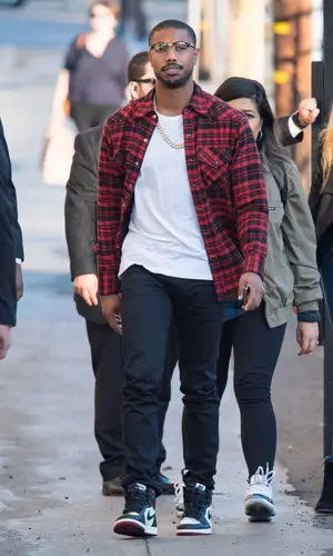 Michael B. Jordan wearing Saint Laurent jeans
