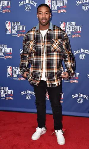 Michael B. Jordan wearing Fear of God jeans