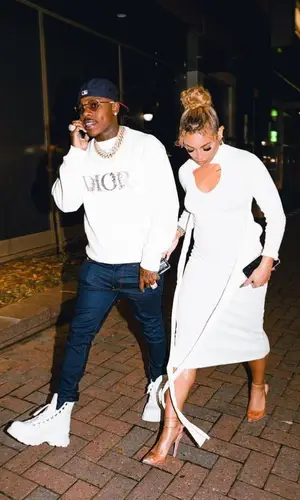 DaBaby wearing Alexander McQueen boots