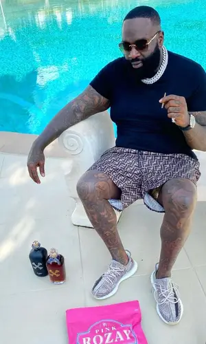 Rick Ross wearing Cartier eyewear