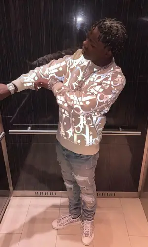 Jackboy wearing Dior sweater