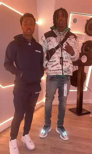 Polo G wearing Louis Vuitton bag