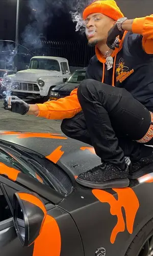 Comethazine wearing Alexander McQueen sneakers