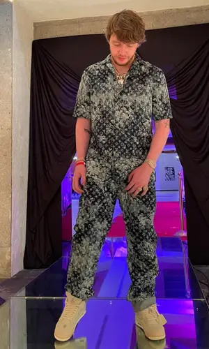 Murda Beatz wearing Louis Vuitton shirt
