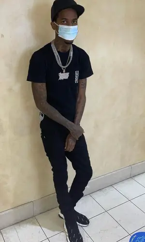 Lil Reese wearing Chrome Hearts t-shirt