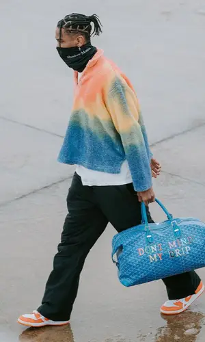 Shai wearing Cactus Plant Flea Market sweatshirt
