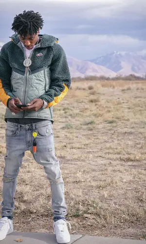 NBA YoungBoy wearing Nike jacket