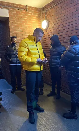 Fredo wearing Nike jacket