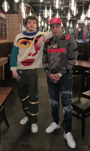 Jack Harlow wearing KidSuper sweater