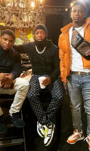 Moneybagg Yo wearing Louis Vuitton bag