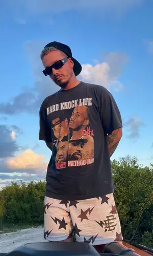 J Balvin wearing Bape shorts