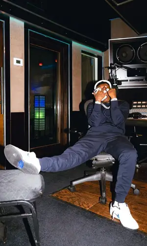 DaBaby wearing Moncler sweatshirt