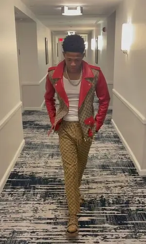 YK Osiris wearing Exclusive Game jacket