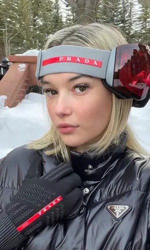 Sarah Snyder wearing Prada eyewear
