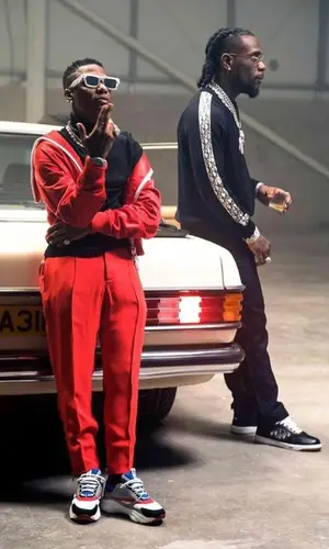 Wizkid wearing Dior sneakers