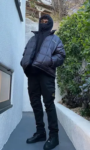 Snot wearing Huf jacket