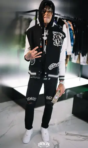 NLE Choppa wearing SoleBoy jacket