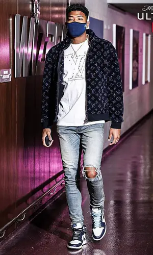 Rui Hachimura wearing Louis Vuitton jacket