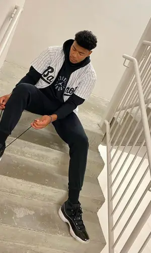 Rui Hachimura wearing MLB jersey