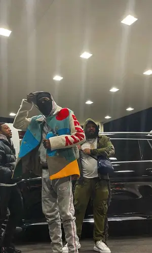 Meek Mill wearing Outftur suit