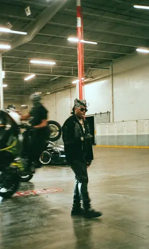 Gunna wearing Amiri top