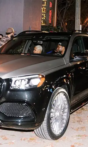 2 Chainz wearing Louis Vuitton bag
