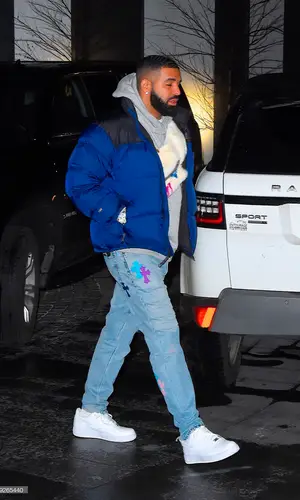Drake wearing Nike sneakers