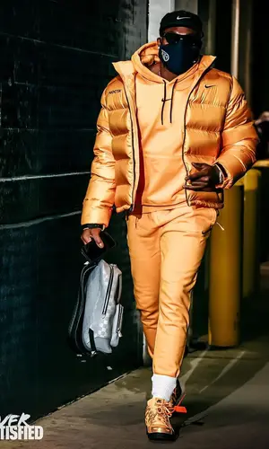 Derrick Henry wearing Nike jacket