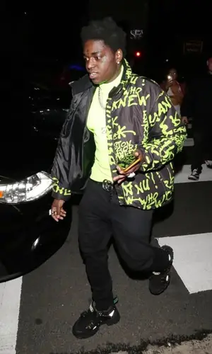 Kodak Black wearing Paul Smith top