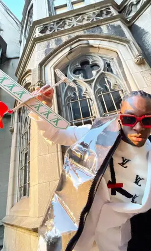 Bloody Osiris wearing Louis Vuitton other