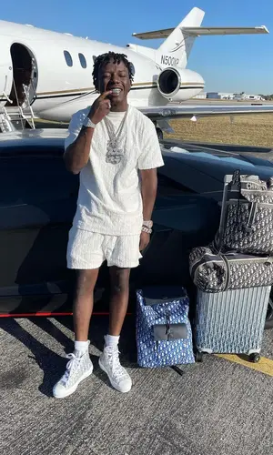 Jackboy wearing Dior bag