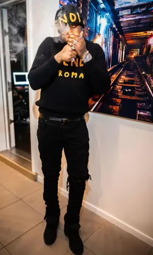 Fivio Foreign wearing Fendi sweater